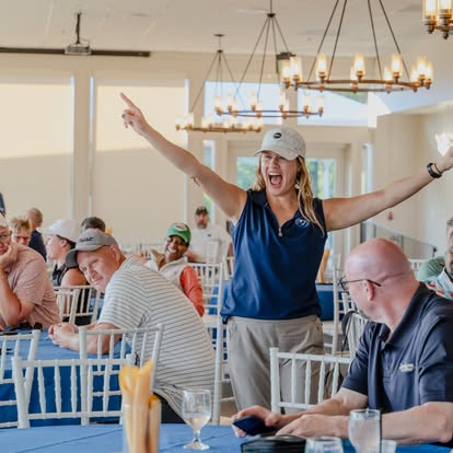 woman celebrating at an event
